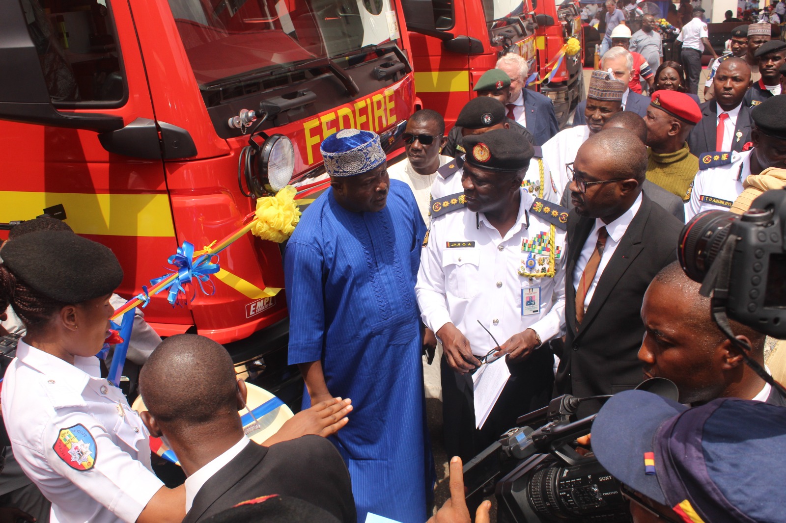 Officials gathered beside Federal Fire Service truck